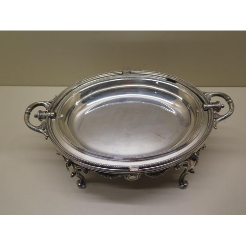 323 - A silver plated oval fold over breakfast/bacon serving dish - Width 34cm