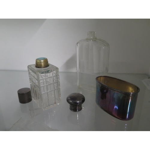 327 - A hip flask with silver cup and top and a silver top bottle - cup approx 1.7 troy oz