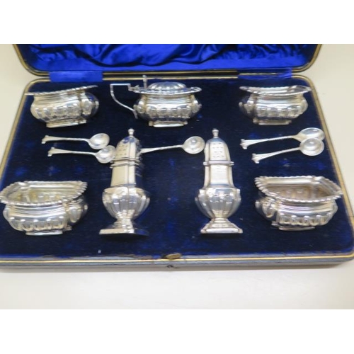 328 - A silver seven piece cruet set Birmingham 1898/99 - boxed - total silver weight approx 10 troy oz - ... 