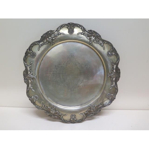 337 - A Portugese silver footed salver - Height 4cm x Diameter 40cm - approx weight 26 troy oz - some slig... 