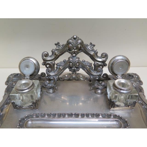 339 - A Portugese silver ornate two bottle desk stand - 42cm x 32cm - weight of stand approx 59.5 troy oz ... 