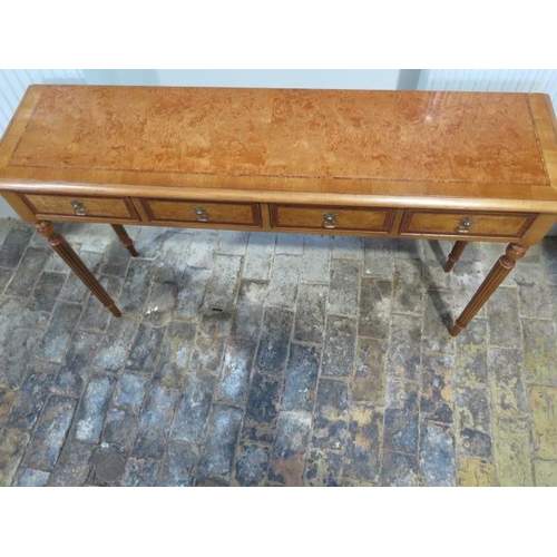 34 - A new burr Birchwood four drawer hall table on turned reeded legs made by a local craftsman to a hig... 