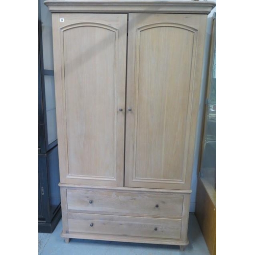 38 - A John Lewis limed oak double wardrobe with two base drawers - Height 204cm x Height 118cm