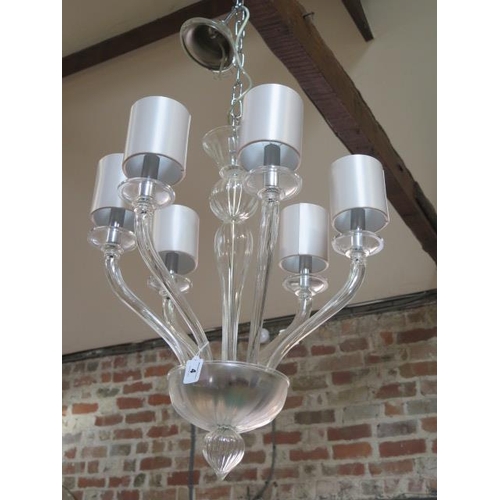 4 - A glass six branch chandelier with grey shades - Height 60cm - plus chain - in good condition, inter... 