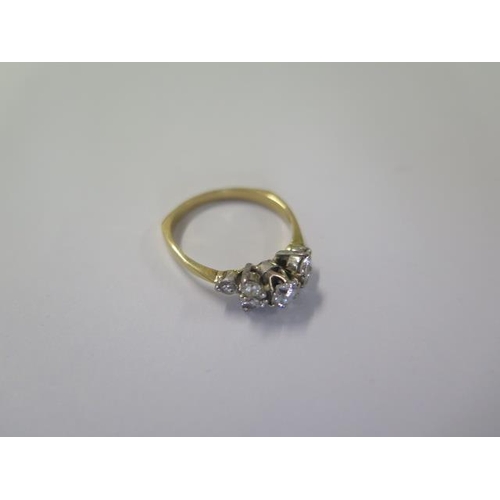 430 - A hallmarked 18ct yellow gold 7 stone diamond ring - the central diamond approx 0.25ct - ring size O... 