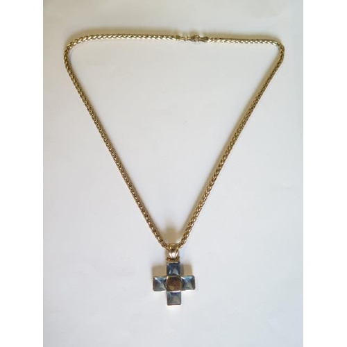 433 - A 9ct yellow gold blue stone cross on a 9ct yellow gold 46cm chain - total weight approx 14.3 grams