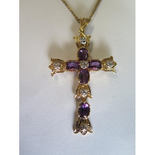 434 - A yellow gold amethyst and diamond crucifix - length 5cm - on a 9ct yellow gold 46cm chain approx we... 