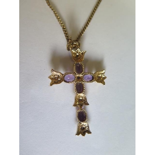 434 - A yellow gold amethyst and diamond crucifix - length 5cm - on a 9ct yellow gold 46cm chain approx we... 