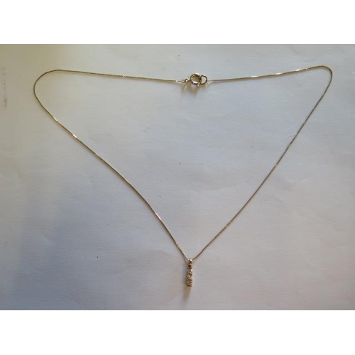 448 - A 9ct gold pendant with .25ct diamonds and a 9ct gold chain - boxed - 48cm chain, approx weight 2. g... 