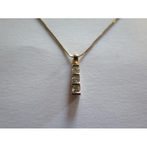 448 - A 9ct gold pendant with .25ct diamonds and a 9ct gold chain - boxed - 48cm chain, approx weight 2. g... 