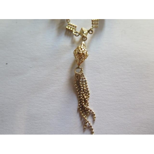 450 - A very pretty 9ct gold tassel necklace - boxed - 40cm long - approx weight 4.4 grams