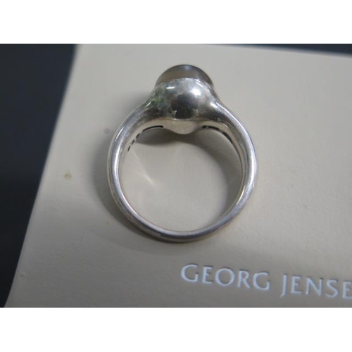 457 - A Georg Jensen sterling silver moonstone ring no. 458 - ring size K/L - with box and outer box, some... 