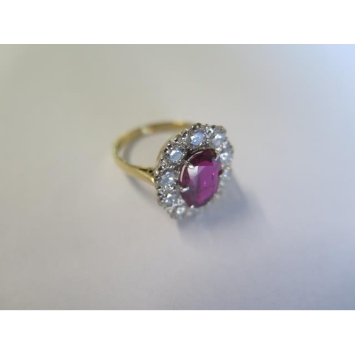 462 - A vintage 18ct yellow gold ruby and diamond ring - ruby approx 2.5 carats, surrounded by approx 1.25... 