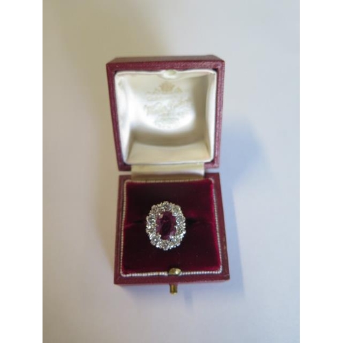 462 - A vintage 18ct yellow gold ruby and diamond ring - ruby approx 2.5 carats, surrounded by approx 1.25... 