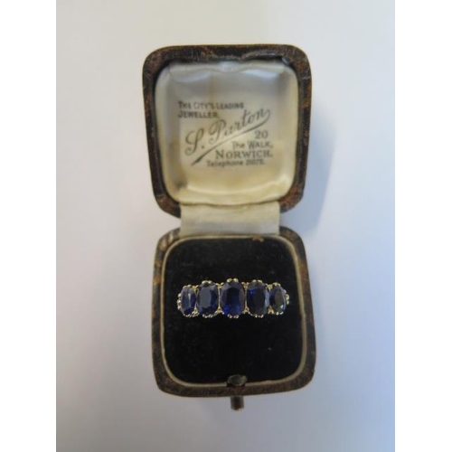 464 - An Edwardian 18ct yellow gold five stone sapphire ring - sapphires are well matched and a good colou... 