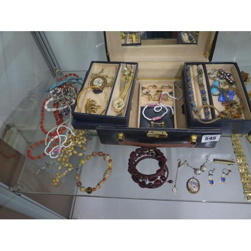 545 - A collection of vintage costume jewellery including brooches, bracelets, necklaces