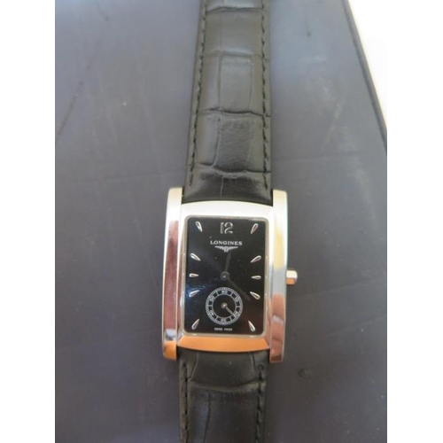 556 - A Longines Dolce Vita quartz wristwatch L.S.655.4 - on a leather strap, running with box and instruc... 