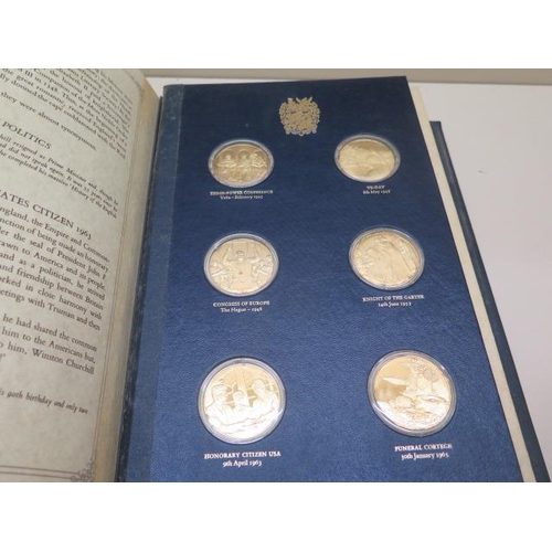 606 - A Churchill Centenary Trust silver gilt medallion collection from John Pinches, 24 medals in a prese... 