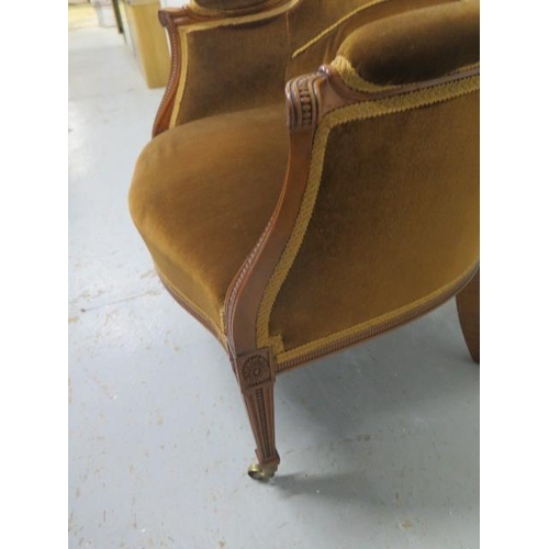 62 - A good quality late Victorian/Edwardian walnut wingback shaped elbow chair with square tapering fron... 