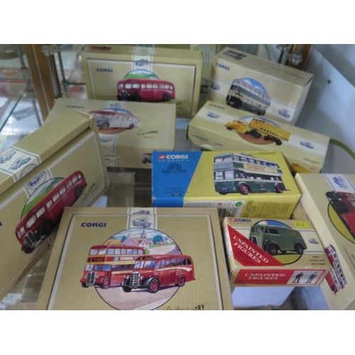 656 - A collection of 24 boxed Corgi Classic buses and trucks