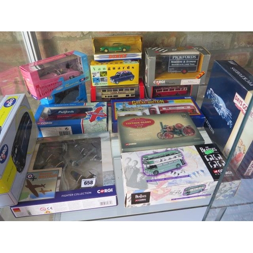 658 - A collection of 14 boxed diecast planes, cars etc including Beatles bus