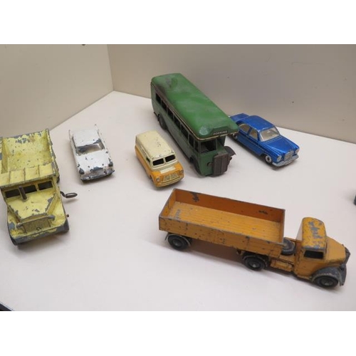 663 - A collection of eleven Diecast Dinky vehicles including three Foden lorries, a Spot On car and a Tri... 