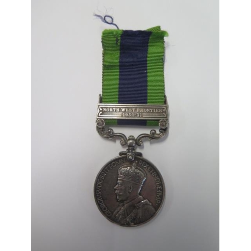 709 - An Indian General Service Medal with North West Frontier 1930-31 bar names to Pte D Smith 5595327 Bo... 