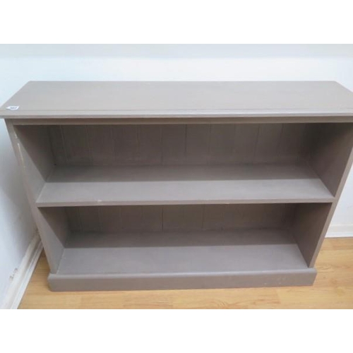 465 - A grey painted bookcase - Height 76cm x 105cm x 26cm