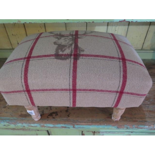 473 - An upholstered 'stags head' stool - Height 26cm x 40cm x 28cm