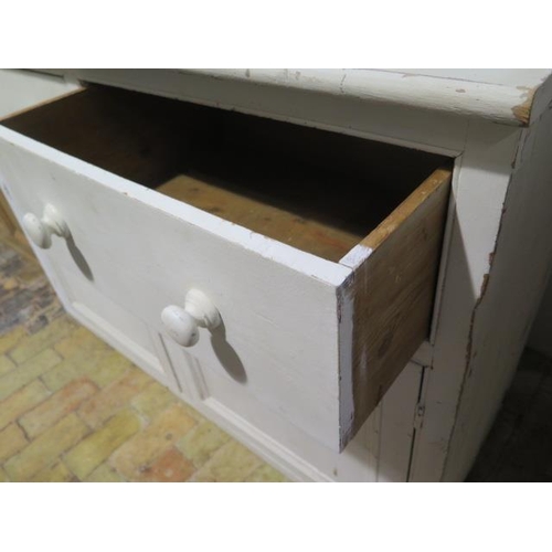 510 - A shabby chic painted pine dresser with an open rack top above a two door two drawer base - Height 1... 