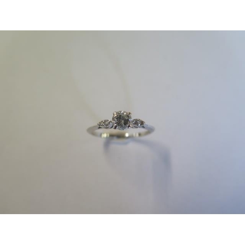 55 - A 14ct white gold five stone diamond ring, centre stone approx half carat - head size approx 5.2mm x... 