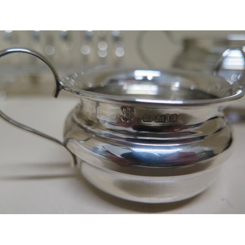 156 - Two silver twin handle bowls - 6cm and 5cm tall - total approx weight 4 troy oz - and a plated toast... 