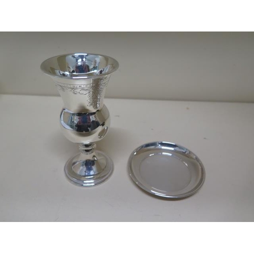 158 - An engraved silver goblet - Height 12cm - and a small silver tray/stand - total weight approx 3.6 tr... 