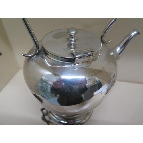 159 - A silver plated spirit kettle with silver burner - Height 30cm and a Maple and Co plated four bottle... 