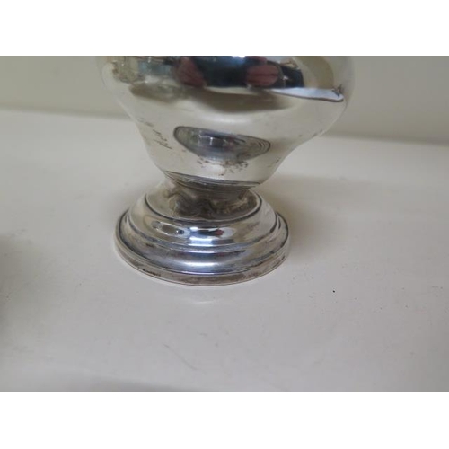160 - A silver sifter - Height 19cm - dented base - three silver top bottles/tidies - glass good - a silve... 