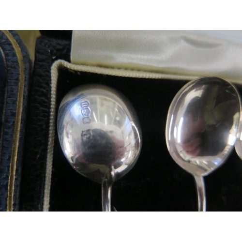 166 - Two boxed sets of enamelled silver spoons and a boxed set of silver coffee spoons - total weight app... 