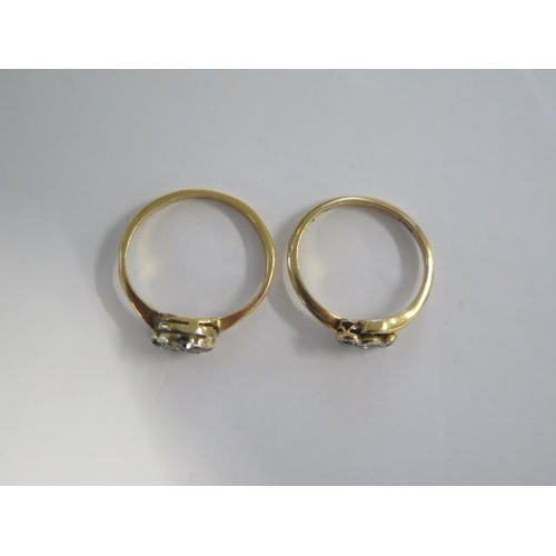 18 - Two diamond rings testing to approx 18ct - ring sizes L and M - total approx weight 3.9 grams
