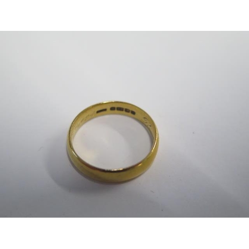 19 - A 22ct yellow gold band ring size M - approx weight 4.5 grams