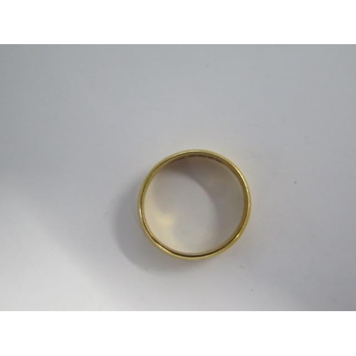 19 - A 22ct yellow gold band ring size M - approx weight 4.5 grams