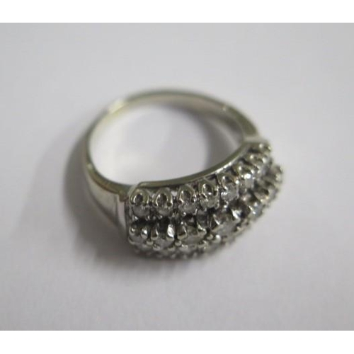 2 - A 14ct white gold diamond ring set with 23 round brilliant cut diamonds approx diamond weight 0.75ct... 