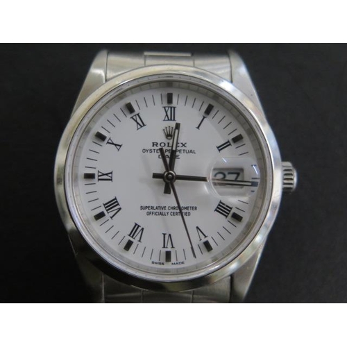 A gents stainless steel 1991 Rolex Oyster Date Perpetual bracelet wristwatch with white dial, baton markers and Roman numerals - 32mm case, model 15210 no. X588578 -running, some usage marks, wear consistent with use, dial, glass good, hands and date adjust - no box or papers
