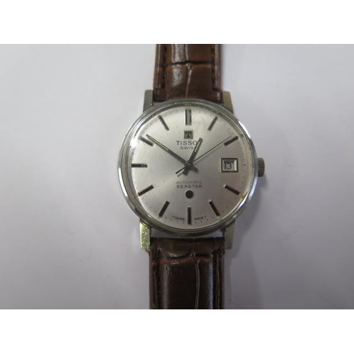 203 - A Tissot stainless steel Automatic Seastar gents wristwatch - 33mm case - on a leather strap - runni... 