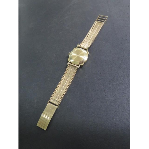 210 - A 9ct yellow gold Longines manual wind wristwatch on a 9ct bracelet strap, 28mm case - approx total ... 