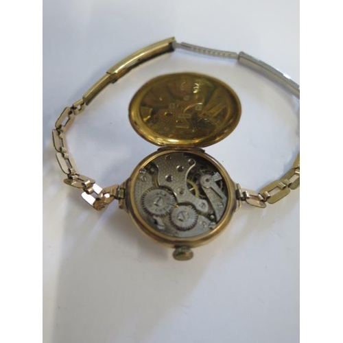 212 - A Rolex 9ct yellow gold wristwatch manual wind, 27mm case on a rolled gold strap - not working - app... 