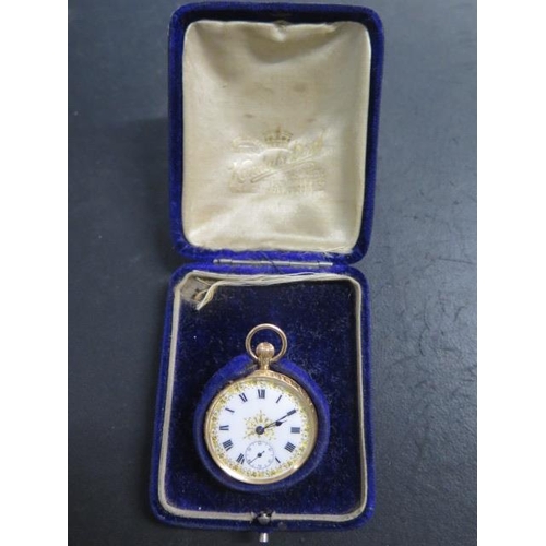 218 - A 10ct 625 gold top wind pocket watch - 33mm case - with enamel dial - in running order - approx wei... 