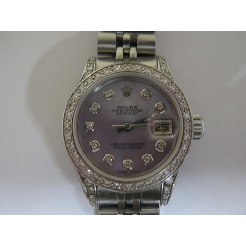 219 - A ladies stainless steel Rolex Oyster Perpetual datejust bracelet wristwatch with after market diamo... 