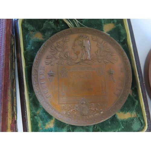 240 - A gilt bronze London 1908 International Exhibition medal, an 1890 Penny Postage Jubilee Medallion - ... 