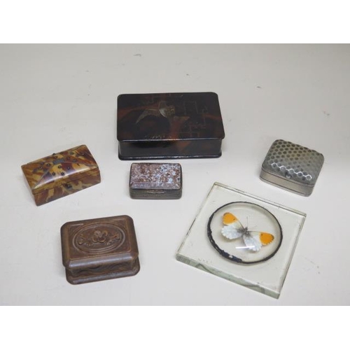 267 - A collection of five small boxes and a paperweight