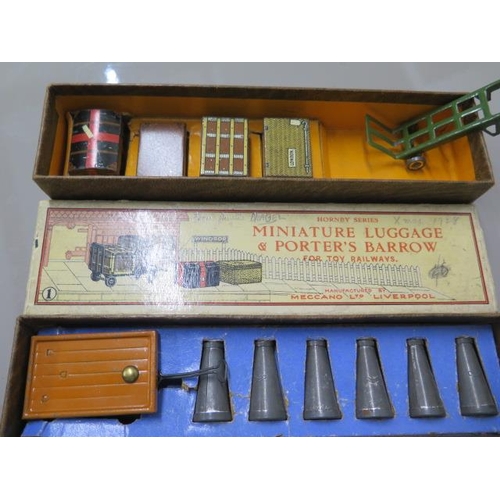 336 - Three boxed Hornby O gauge accessory sets, platform accessories, milk cans with trucks and luggage a... 