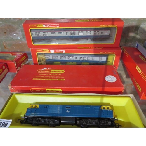 339 - Horby OO gauge - a BR Hymek Diesel Loco - boxed and assorted rolling stock, buildings etc mostly box... 